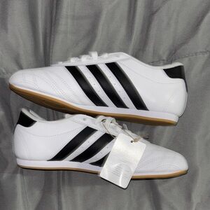 Adidas women’s size 7  White Sneakers with Black Stripes